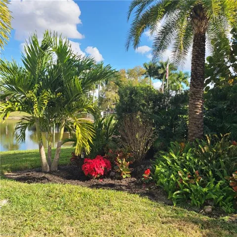 View of grassy yard featuring a water view