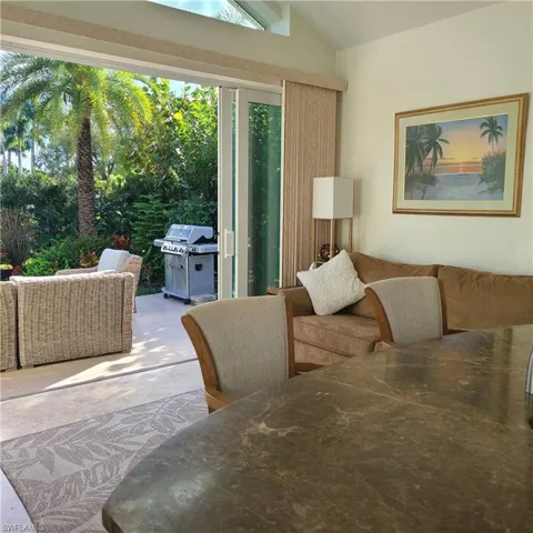 Living room featuring lofted ceiling