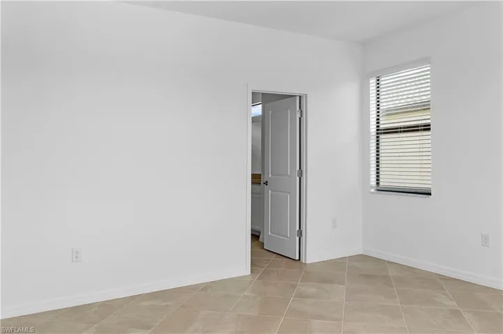 Empty room with baseboards