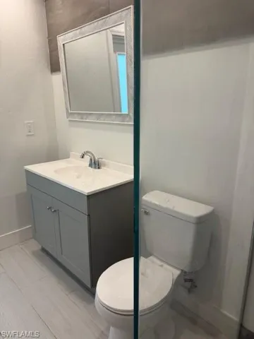 Bathroom featuring toilet and vanity
