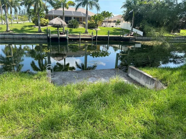 428 SE 13th Ter freshwater canal with Southern exposure, seawall and concrete dock already in place!