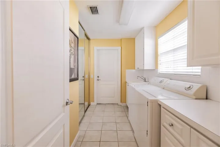 Laundry room leads to the garage.