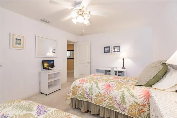 Guest bedroom is next to the guest bathroom.
