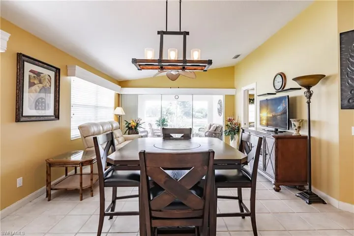 Dining area is next to kitchen.