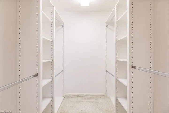 Very adjustable closet system in both walk in closets.