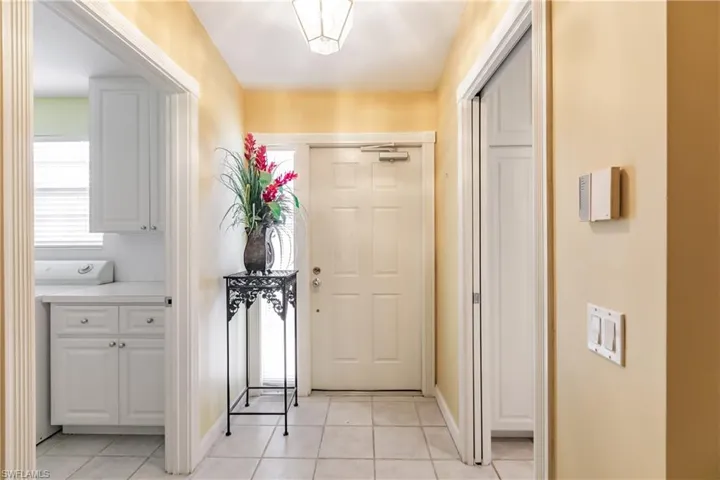 Warm welcome upon entering the home.  Neutral colors.