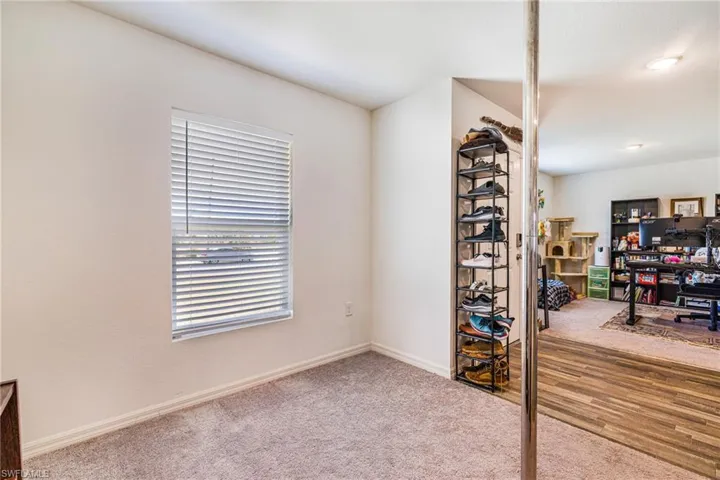 2nd Den/Flex Space/Home office/dining area with visible vents and carpet