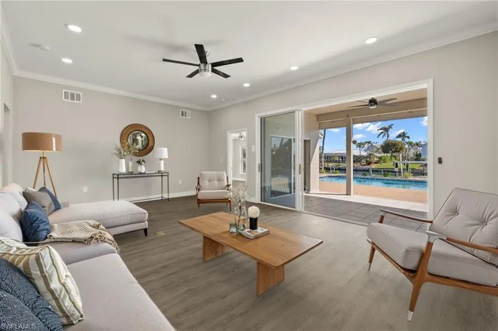 Spacious interior with wood-finish flooring and recessed lighting