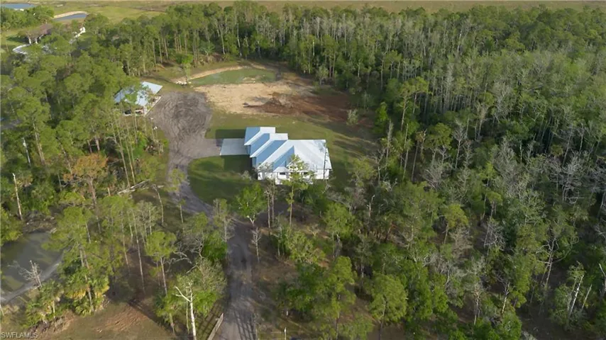 Drone / aerial view of a heavily wooded area