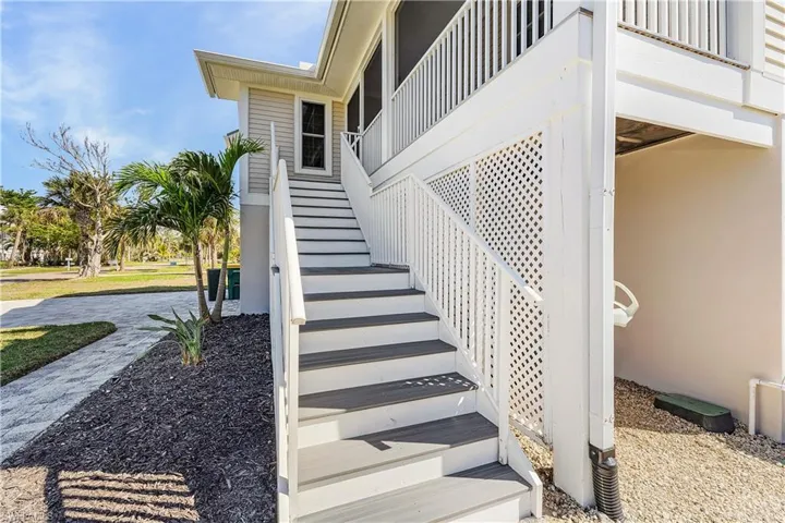 View of stairs to covered lanai