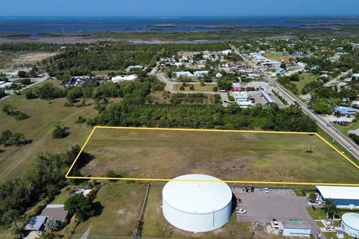 Expansive undeveloped land parcel with a clear, level surface