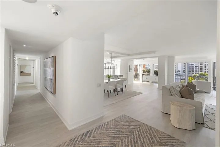 Hall featuring light wood-type flooring