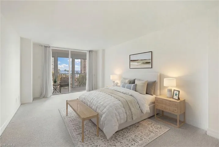 Virtually Staged - Carpeted bedroom featuring access to outside and expansive windows