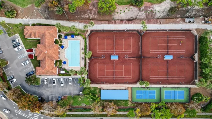 Views of community swimming pool, two pickleball courts, and 4 tennis courts.