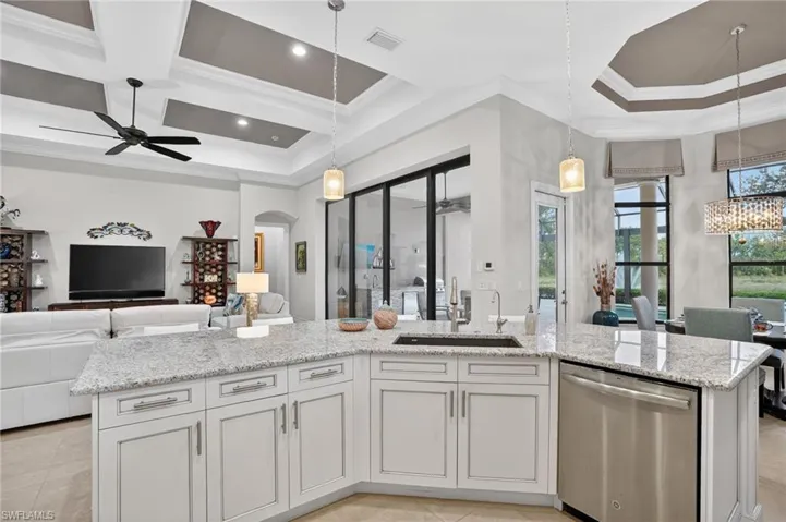 with open views of family room, and lanai sliders with impact glass