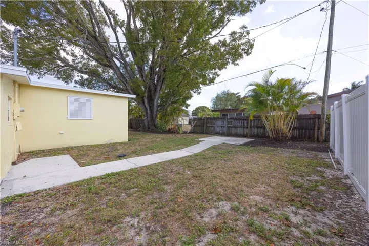 View of fenced backyard