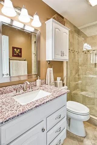 Master Bathroom with vanity and a stall shower