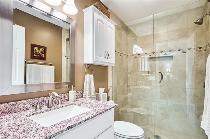 Master Bathroom featuring vanity and a shower stall