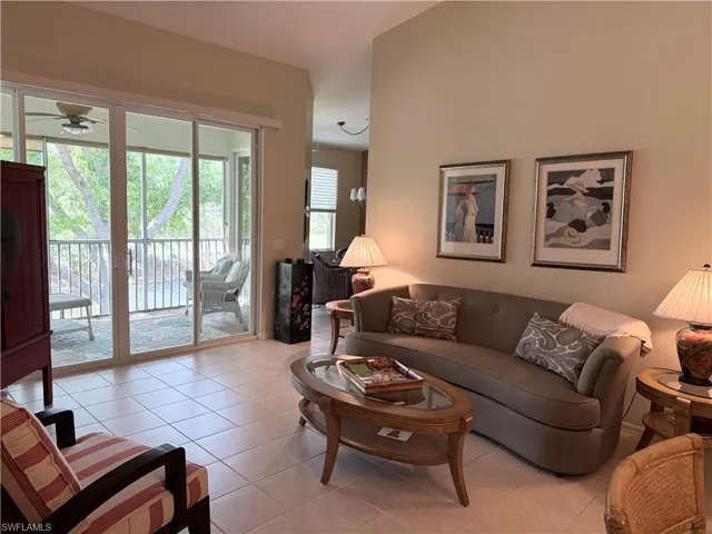 Living area featuring light tile patterned floors