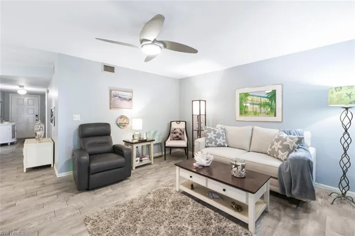 LIVING ROOM TO FOYER