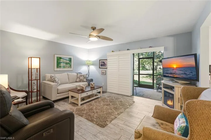 LIVING ROOM WITH PLANTATION SHUTTERS