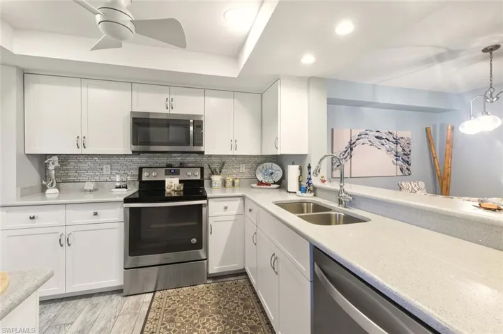 QUARTZ COUNTER ON SHAKER CABINETS