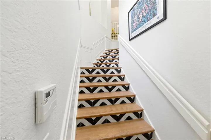 Staircase with a textured wall