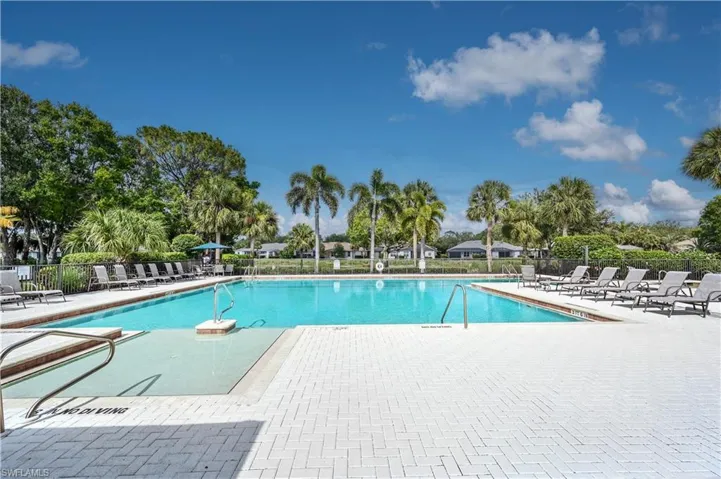 Community pool featuring a patio area