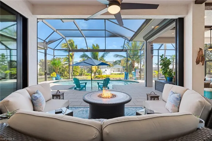 View of patio / terrace with a lanai and an outdoor living space
