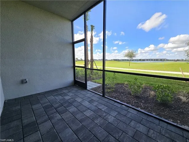 Unfurnished sunroom featuring golf course view