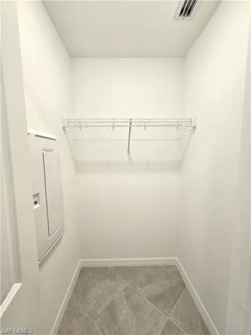 Walk in closet with electric panel