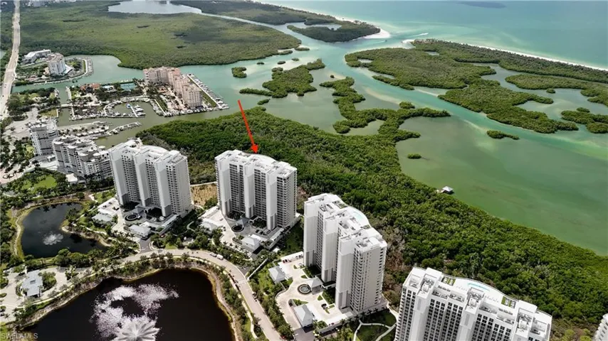 Aerial overview of property's location featuring a nearby body of water