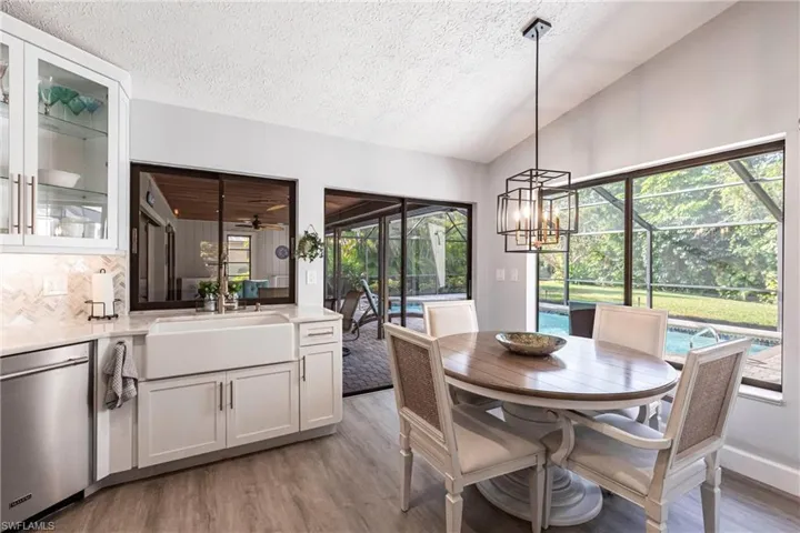 Eat in kitchen with sliding door out to enclosed lanai