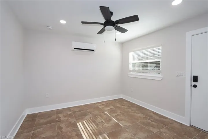 Unfurnished room with a ceiling fan and recessed lighting