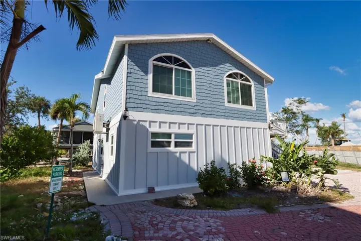 View of side of home featuring board and batten siding