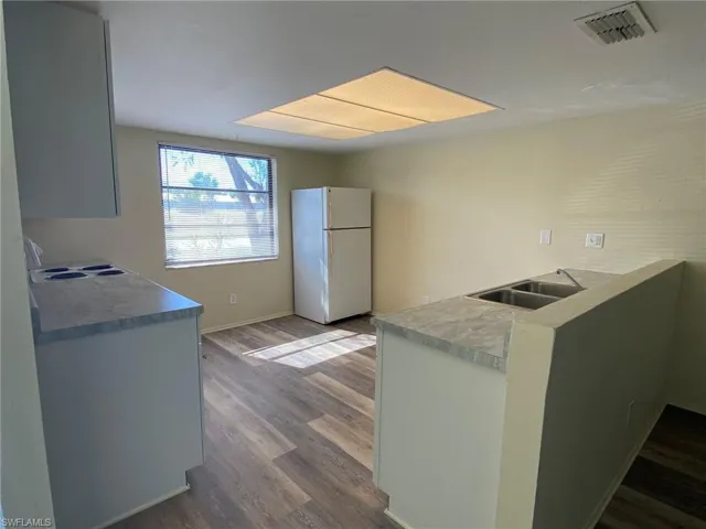 Open eat-in Kitchen with large window giving great natural light