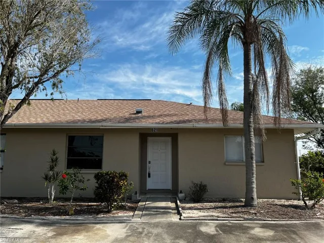 2 Bedroom, 2 Bath duplex with screened lanai and large open patio area.