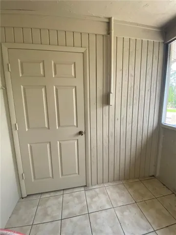 Laundry area with washer/dryer hook-up enclosed on Lanai.