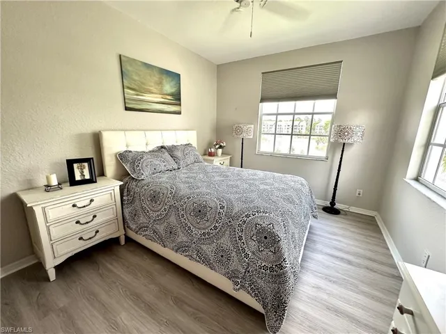 This bedroom has the luxury of an en suite and a walk-in closet.