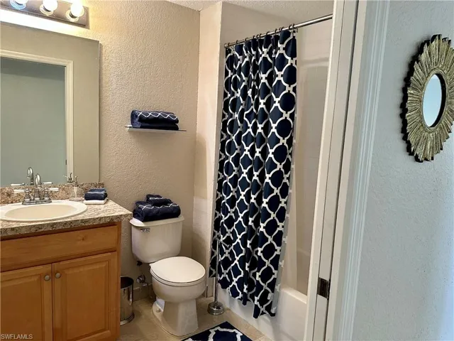 The 2nd bathroom features a shower/tub combination and a linen closet.