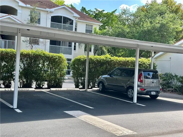 A reserved parking space under a carport is convenient and provides shade for the car.