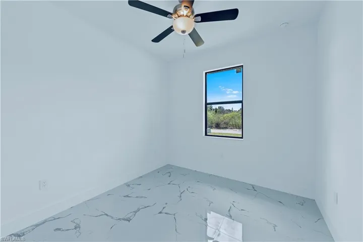 Unfurnished room with ceiling fan