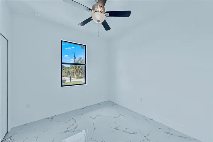 Empty room with ceiling fan