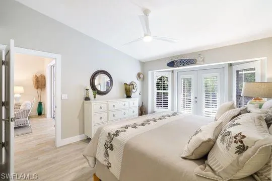 Bedroom featuring french doors, ceiling fan, access to exterior, and light wood-type flooring
