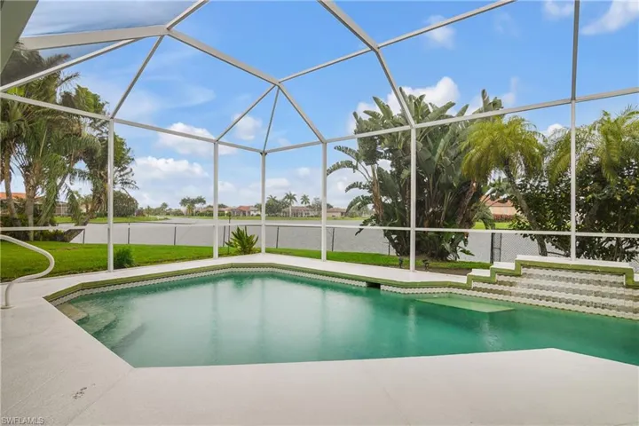 View of pool featuring a lanai