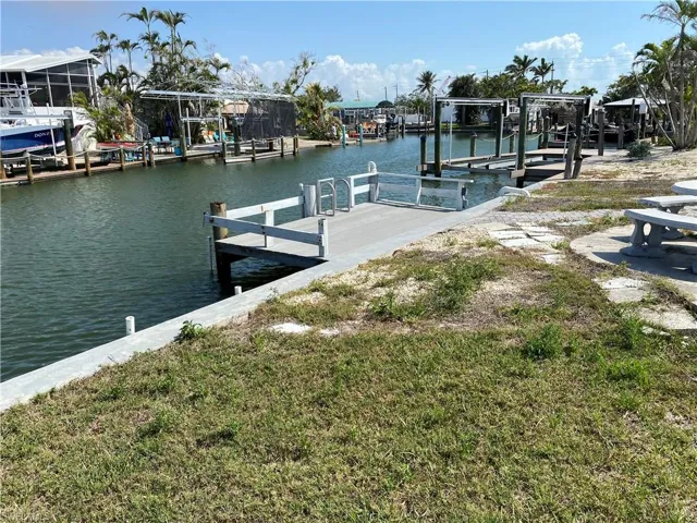 Dock with a water view and boat lift