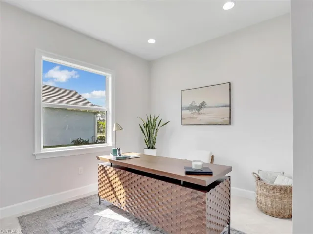 Office featuring baseboards and recessed lighting