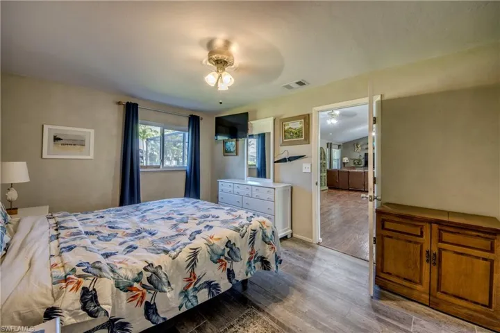 Bedroom with wood finished floors