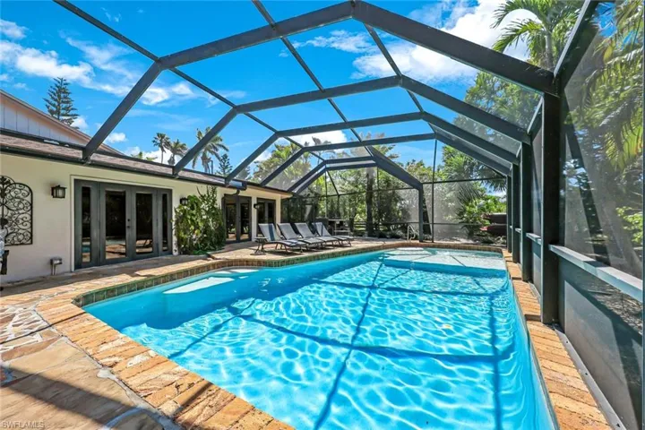 LOOK NO FURTHER! DESIRABLE GULF ACCESS POOL HOME IN THE NONGATED COMMUNITY OF GULL HAVEN!