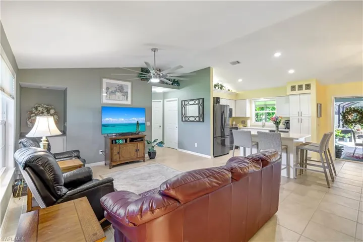 Great room with cathedral ceilings offer lots of natural light.